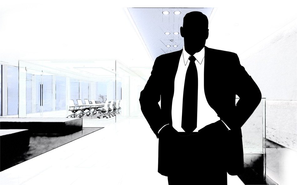 silhouette of businessman on the background of buildings