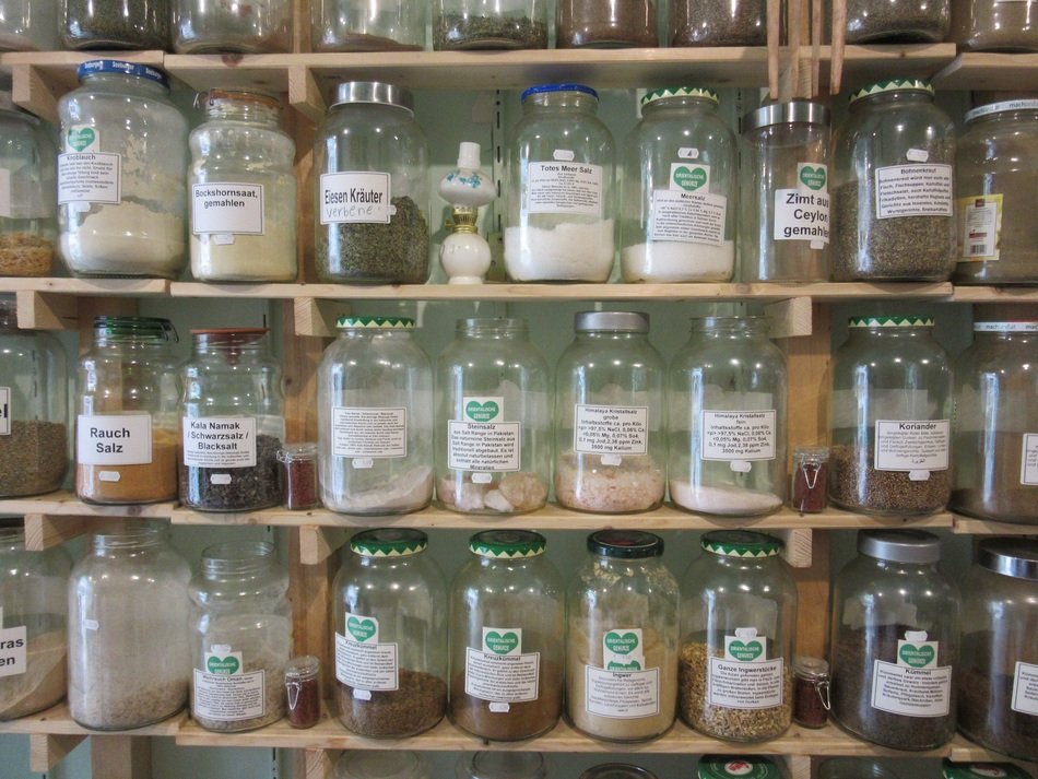 spices in glasses on shelves