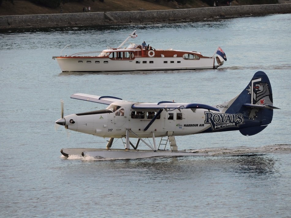 boat and airplane on the water