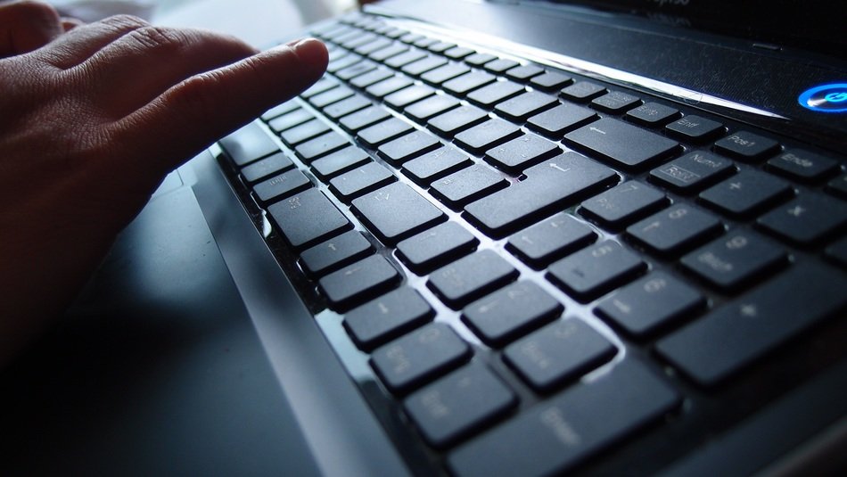 hands on keyboard close up