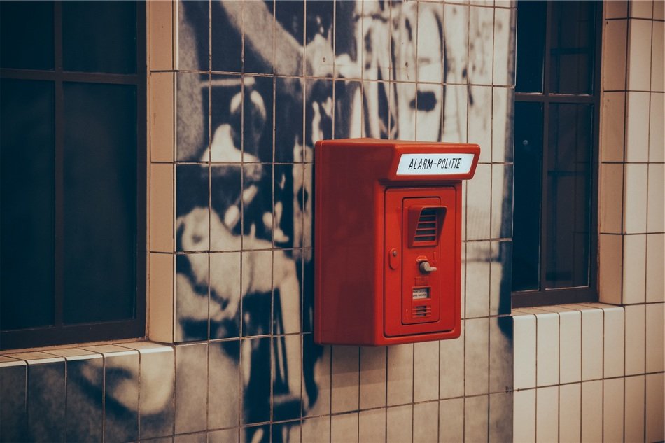 telephone to call the police on the facade of the building