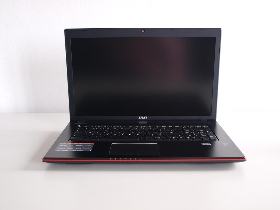 Photo of black and red laptop
