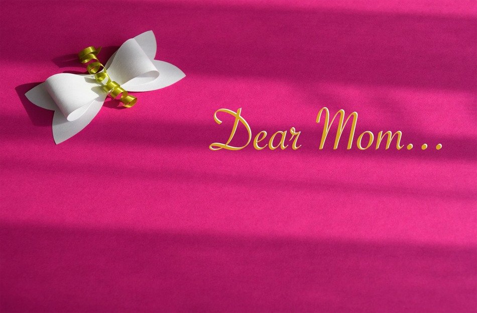 pink greeting card with a bow