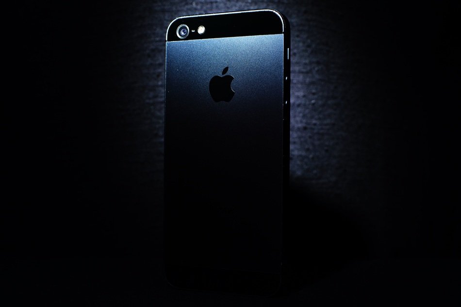 black iphone at dark background