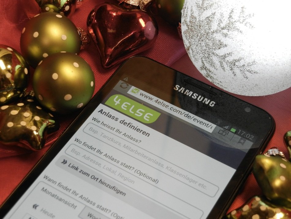 Smartphone and Christmas tree decorations
