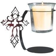 Beautiful candle in the glass and Cross