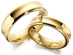gold wedding rings on a white background