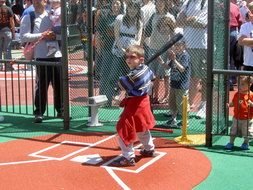 little boy playing baseball