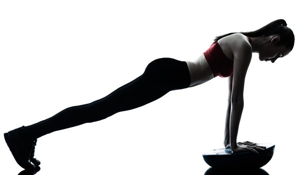 girl doing fitness with Bosu Ball
