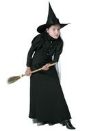 girl in a witch costume on a white background