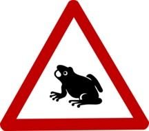 caution road sign with frog