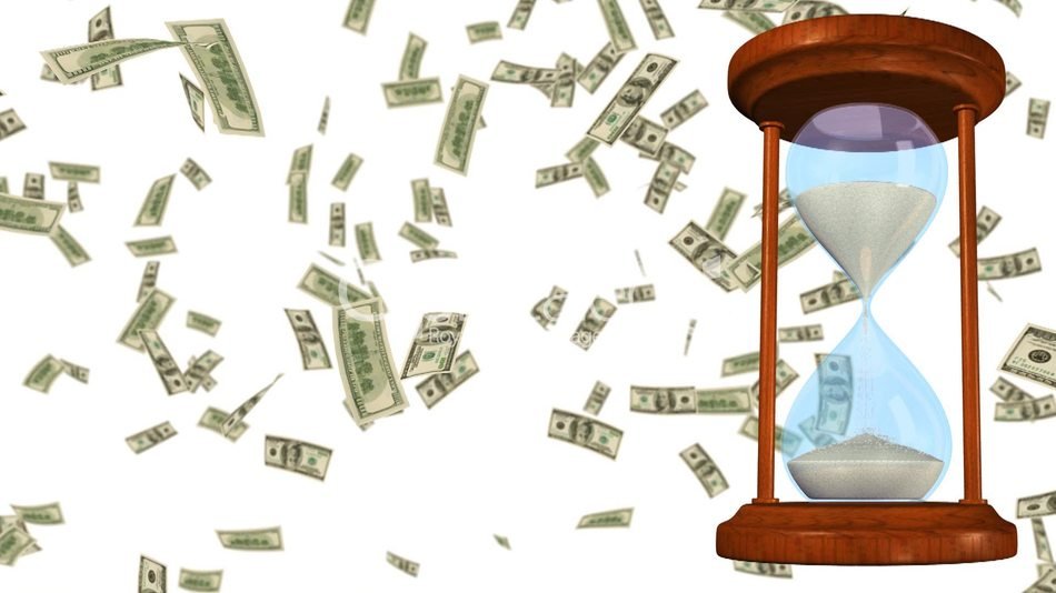 flying money near the hourglass