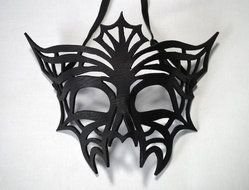 black carnival mask on a white background