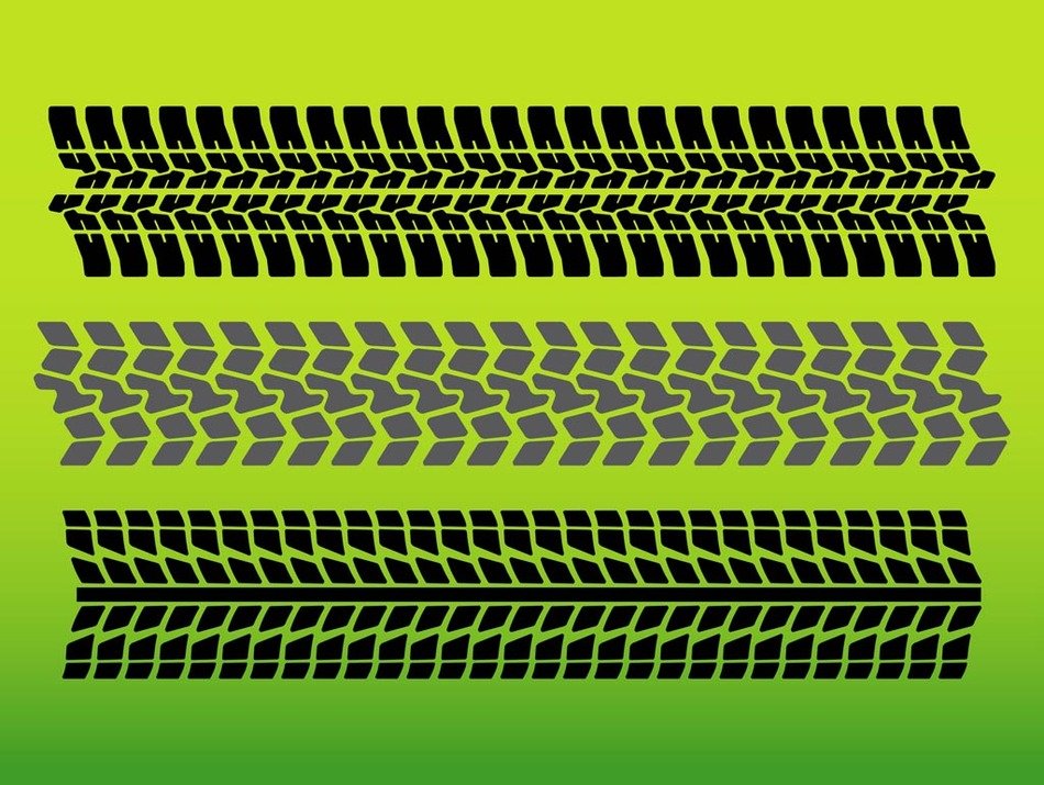 Tire Tracks at green background