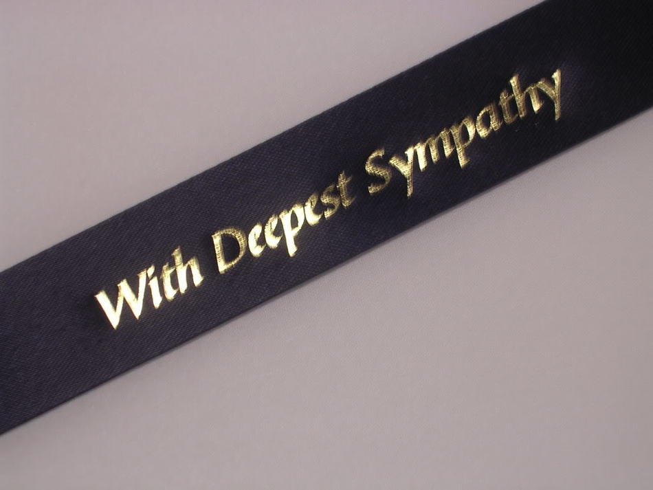 band with lettering with deepest sympathy