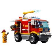 lego figure near a fire truck