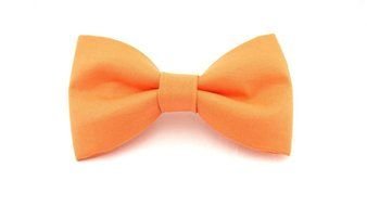 light orange bow tie on a white background