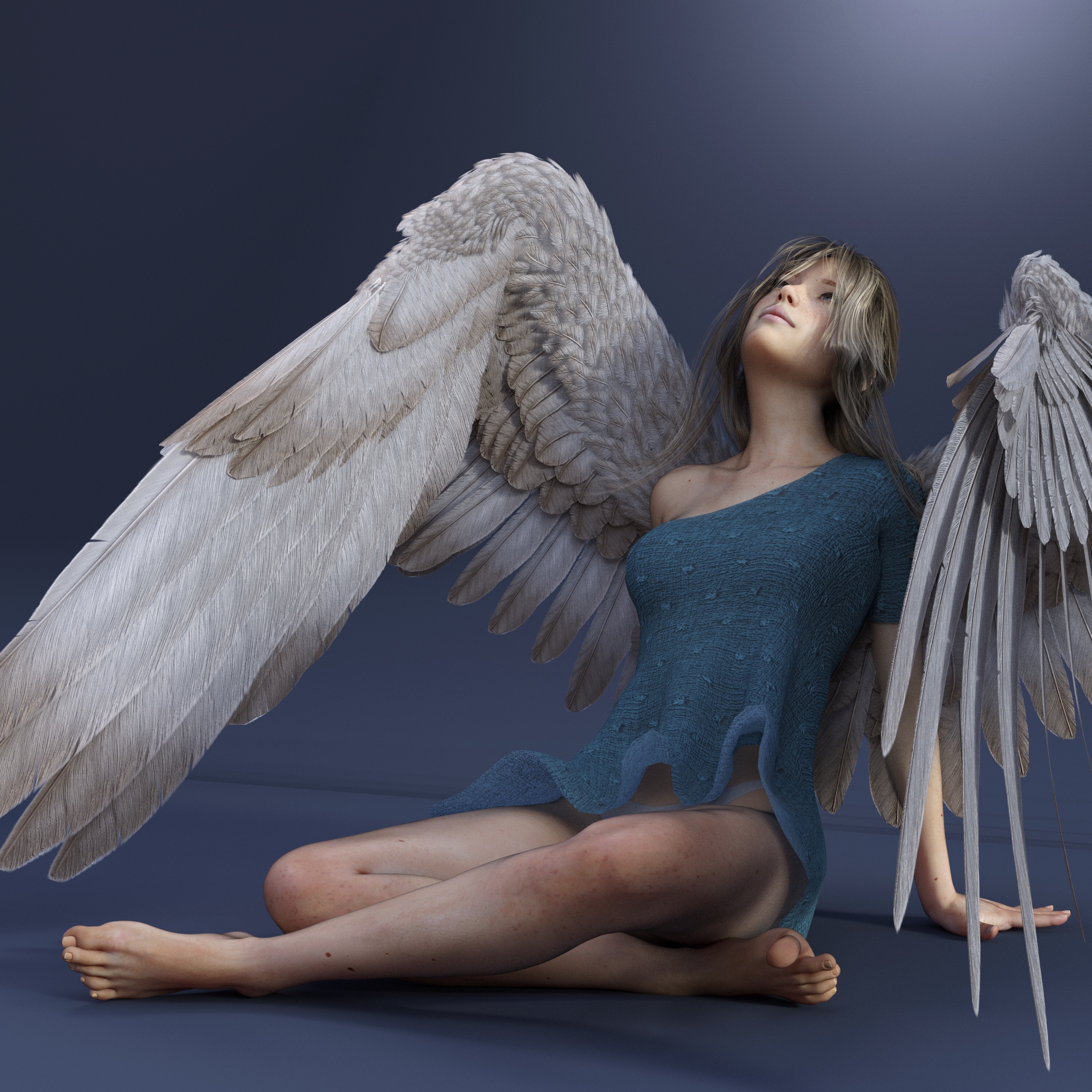 Сидящий ангел с крыльями