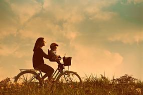 Mother with Child ride Bicycle