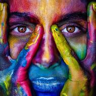 photo of a multi-colored face of a girl