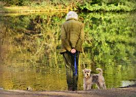 Woman Elderly Standing and dog