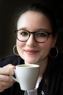 portrait of a woman with cup of coffee