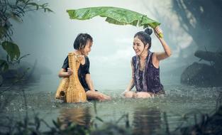 girls in the lake during the rain