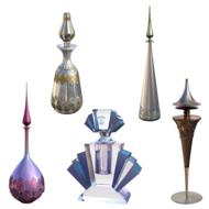 Colorful, shiny perfume bottles at white background