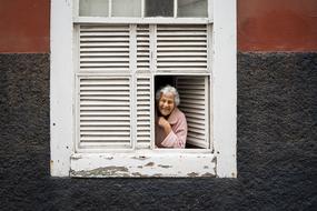 Lady looking out of Window