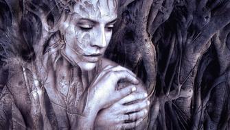 black and white mystical image of a girl and branches