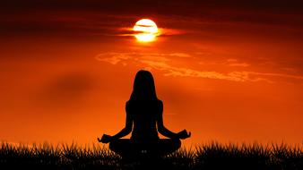 relaxing woman at sunrise