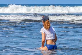 woman siting on the sea beach