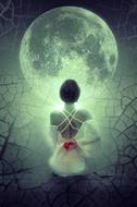 mystical image of a bride on a background of the big moon
