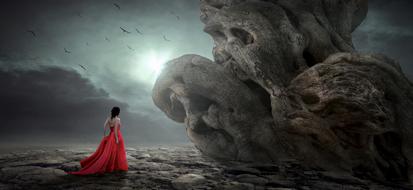 Woman on the mystical landscape with the light