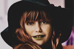 portrait of a pretty girl in black hat