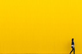 girl on the yellow wall