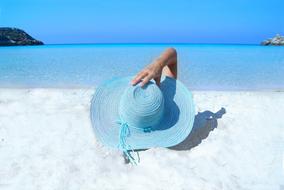 Fashion Sun Hat woman on beach