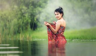 Woman Washing Vietnam river