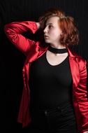 posing model in red blazer