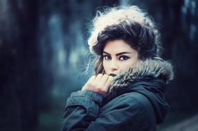 photo of a beautiful girl in a winter jacket
