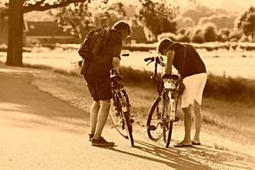 Man Woman in bicycle