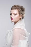 beautiful model in a white airy dress