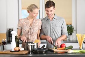 photo of couple cooking in the kitchen