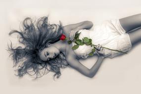 young woman with red rose