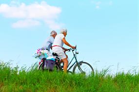 old Man Woman bike grass