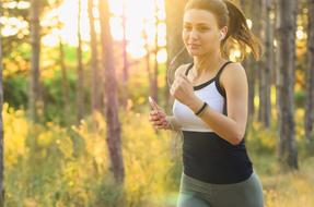 jogging woman in the forest