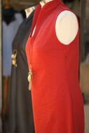 red and black dresses on mannequins