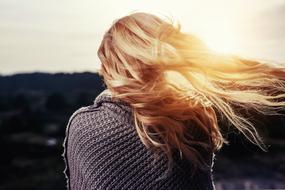 photo of blonde in windy weather