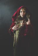 medieval queen in a red hood