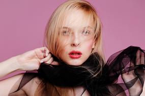 women Fashion, Blonde girl in black scarf at purple background